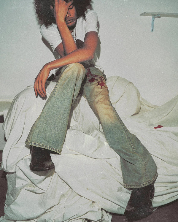 4Tra _ "SUPPORT & PAIN" EMBROIDERED FLAIL FLARE JEANS